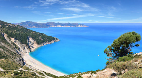 A view from the hillside at the famous Myrtos Beach on the island of Kefalonia in Greece