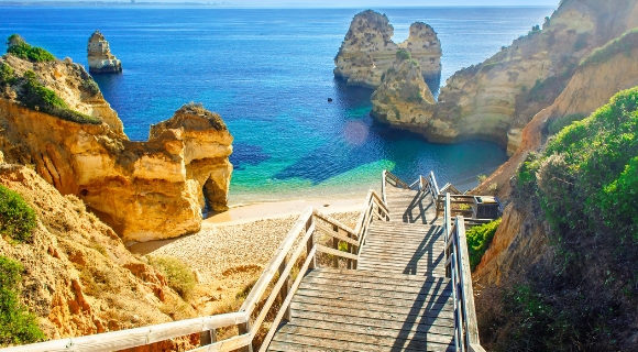 Footbridge to a rocky beach in the Portuguese town Lagos