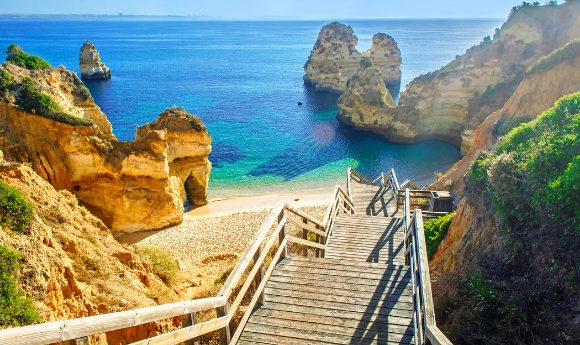 Footbridge to a rocky beach in the Portuguese town Lagos