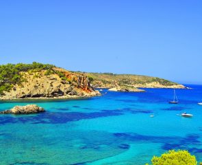 Cala Xarraca Ibiza Beach and its stunning sapphire waters.