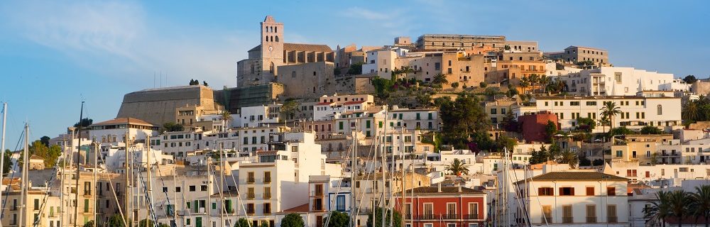 Panorama of Ibiza Town and its whitewashed houses from the Mediterranean Sea