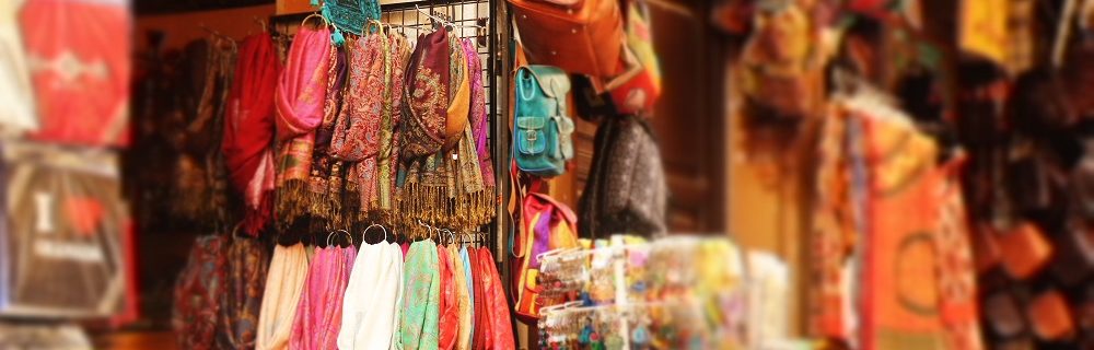 Authentic market stalls and Spanish shops filled with colourful fabrics.