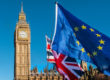 European and UK flag in front of Big Ben with a bright blue sky as the backdrop