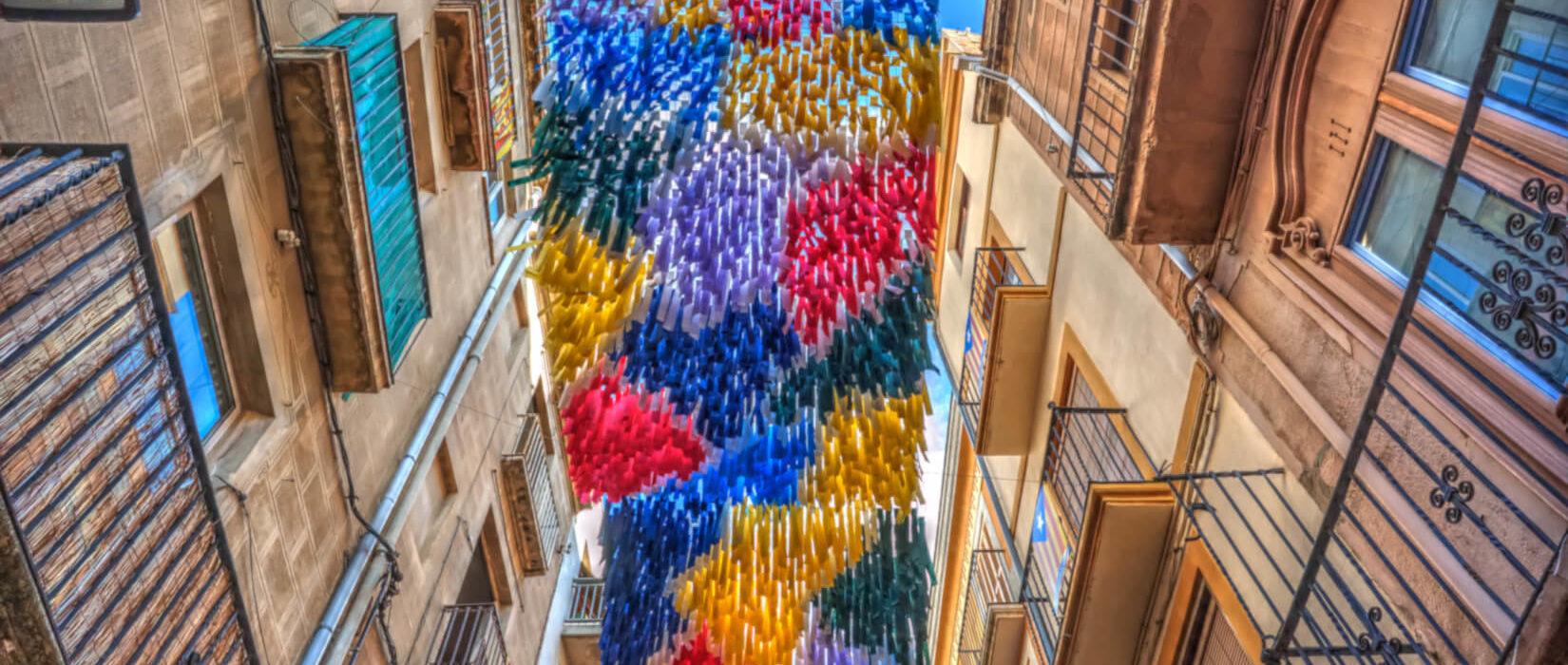 Colourful ribbons aloft during a festival in Spain