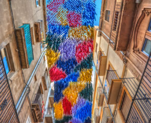 Colourful ribbons aloft during a festival in Spain