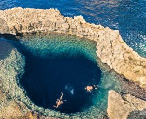 Overhead view of divers at the Blue Hole in Dwejra, Gozo