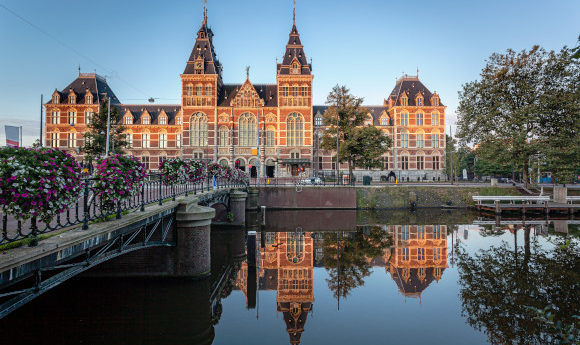 The Museum Quarter in Amsterdam and canals and State Museum at dusk