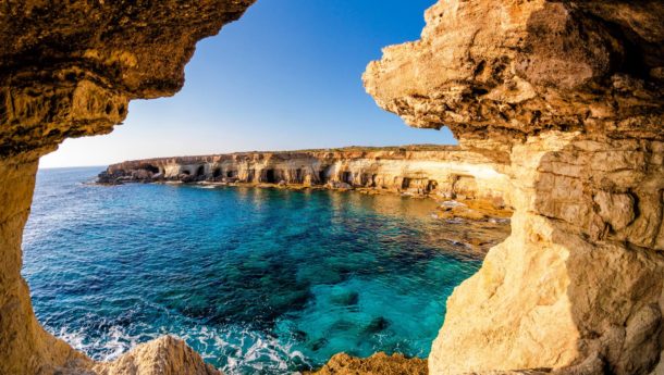 The ocean through rocks in Portugal