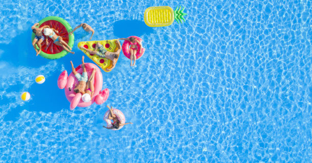 Friends in the pool with Inflatables