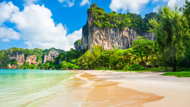 Beauty beach with yellow sand and crystal clear water in Thailand