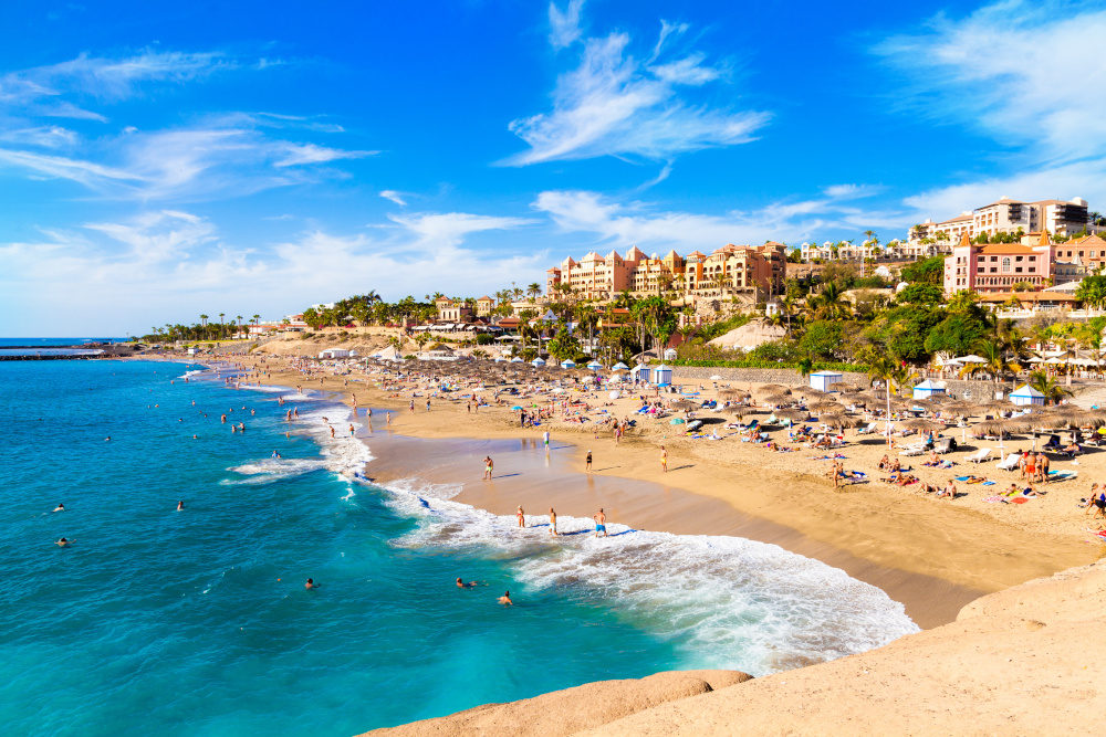 Summer holiday on El Duque beach in Tenerife, famous Adeje coast on Canary island, Spain