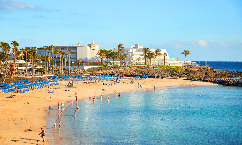 A beautiful golden sand beach in the resort of Playa Blanca on the island of Lanzarote