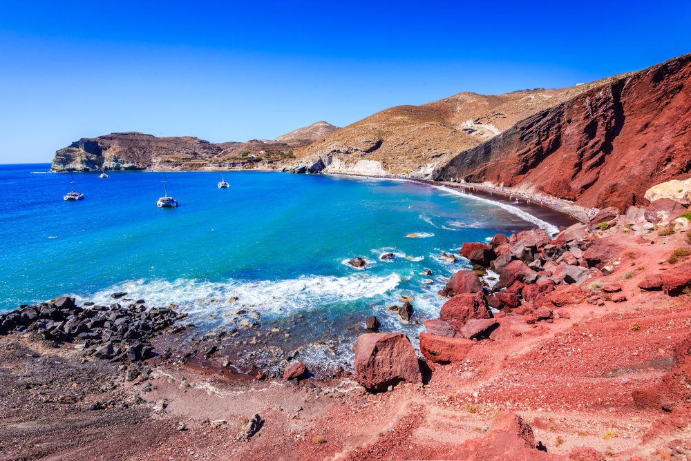 Santorini, Greece. Red Beach is one of the most beautiful and famous beaches of Thira island, Aegean Sea, Cyclades.