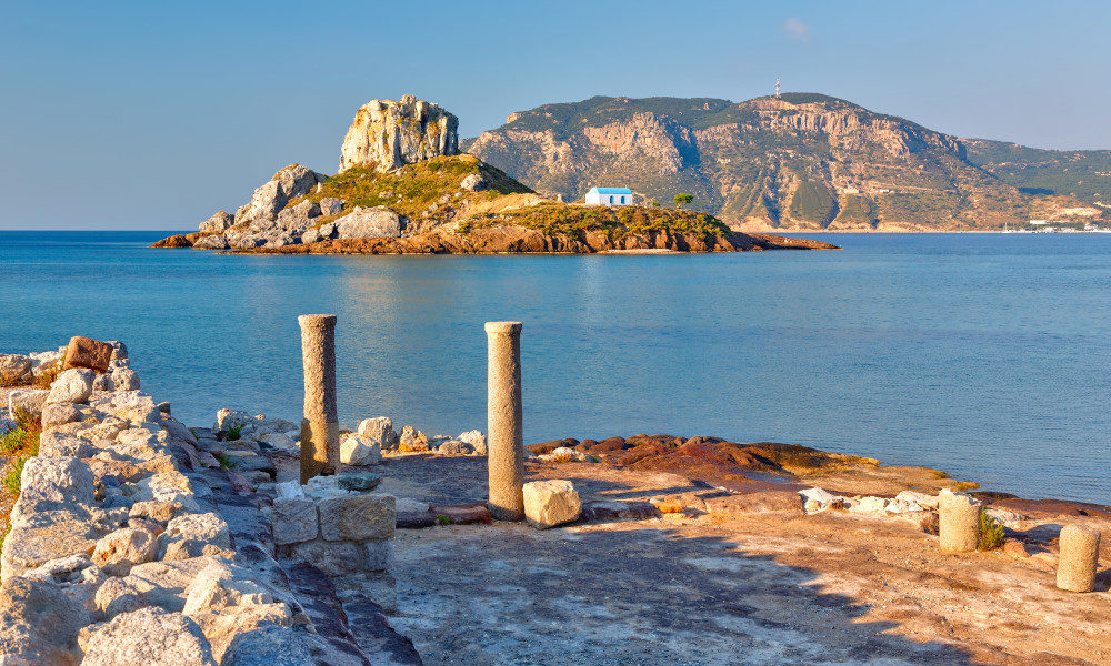 The ruins of Kefalos Beach with the sea in the background