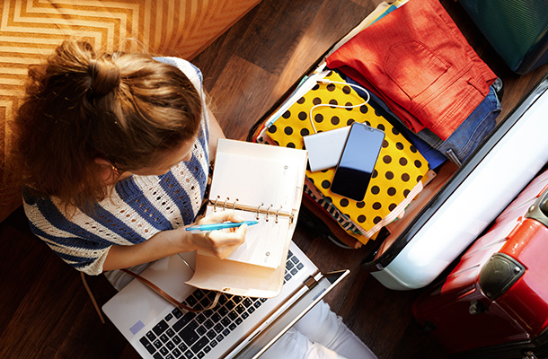 Top view of woman planning a holiday