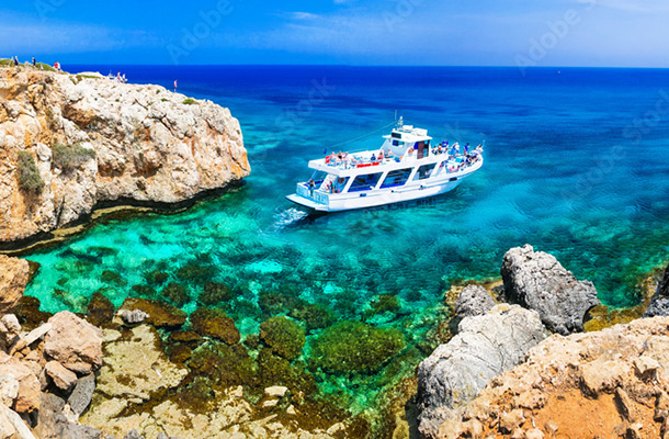 Tour boat on clear blue water